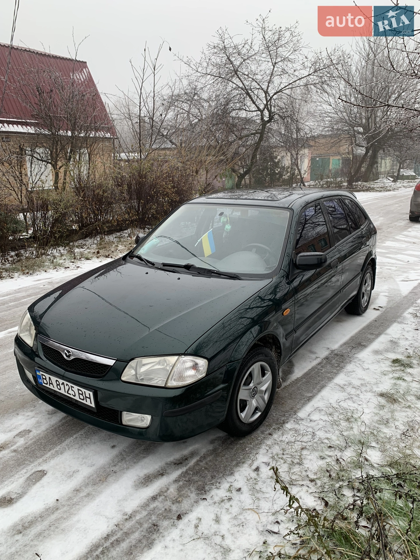 Mazda 323, 1998