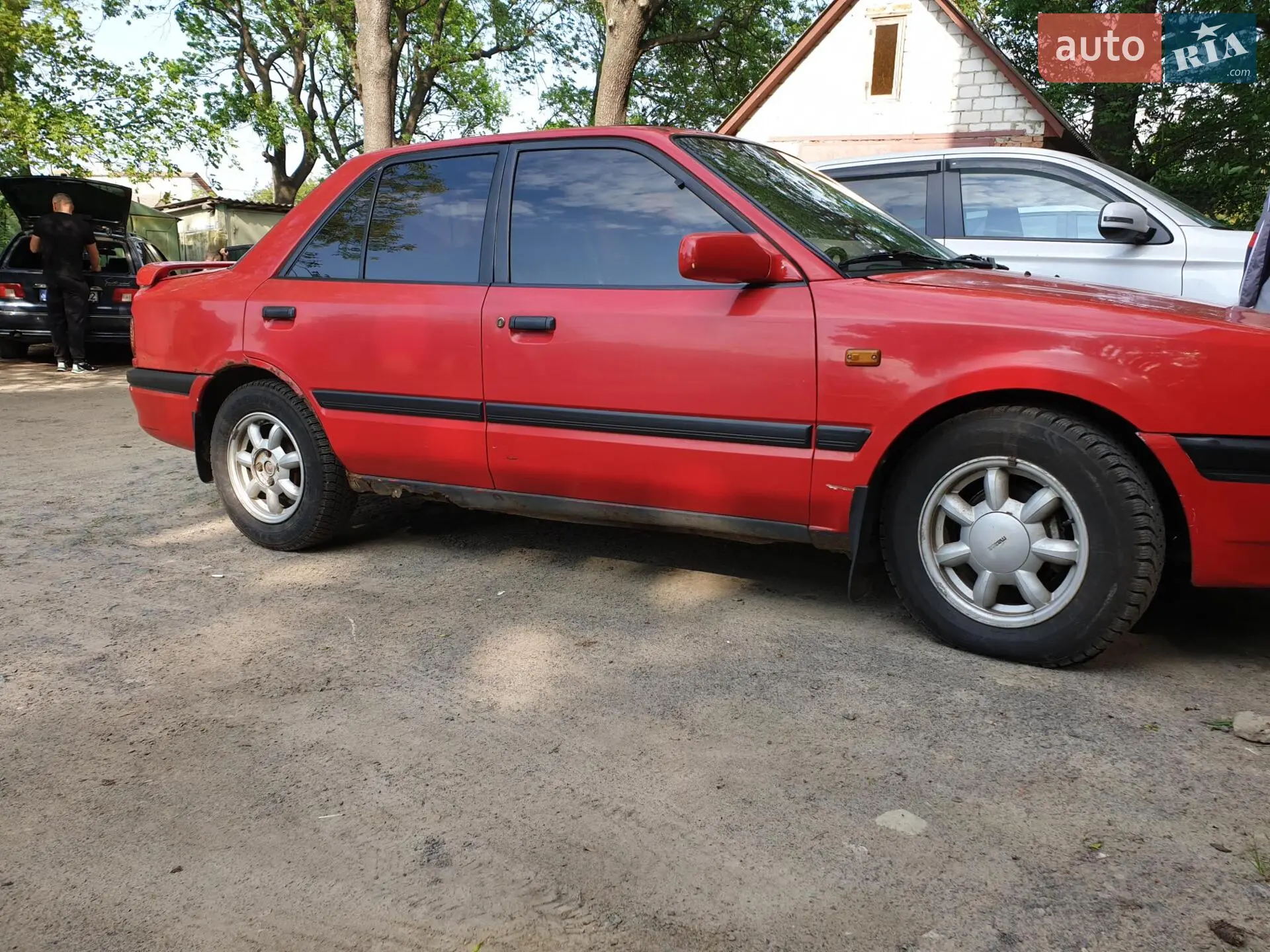 Mazda 323 1993 — 1