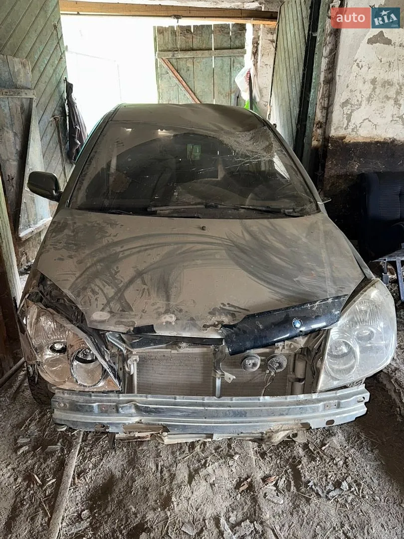Geely MK 2011 — 1