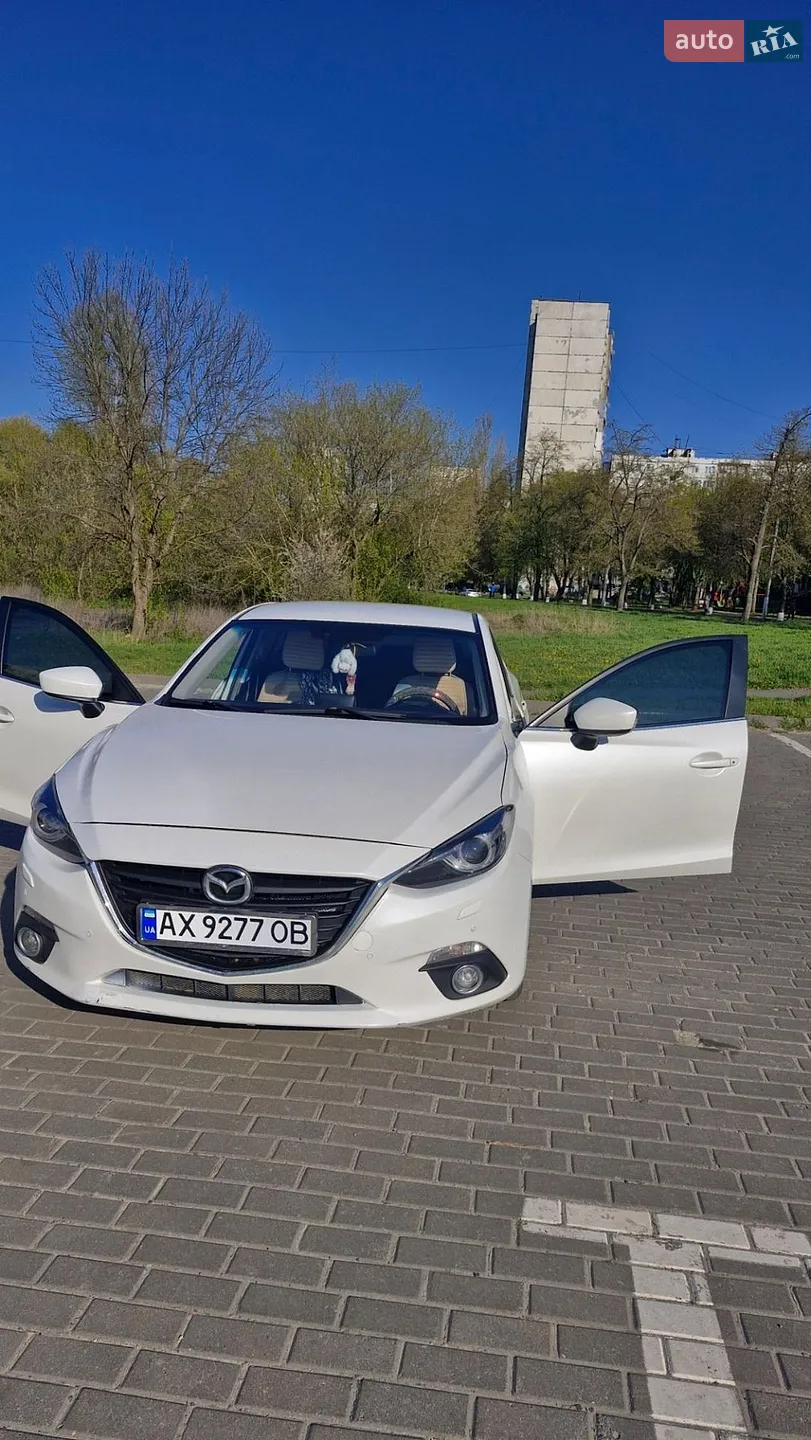 Mazda 3, 2013