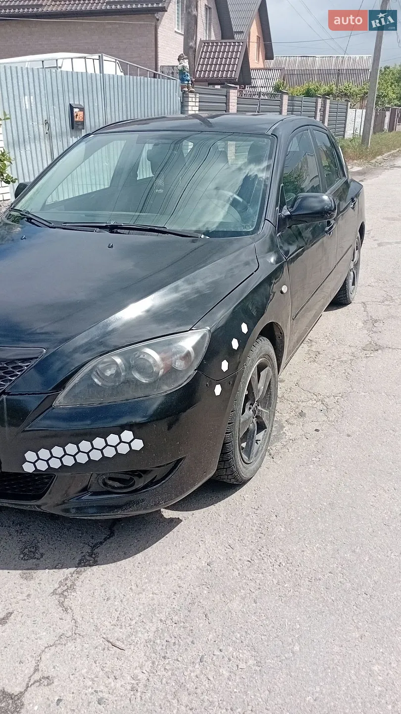 Mazda 3, 2004